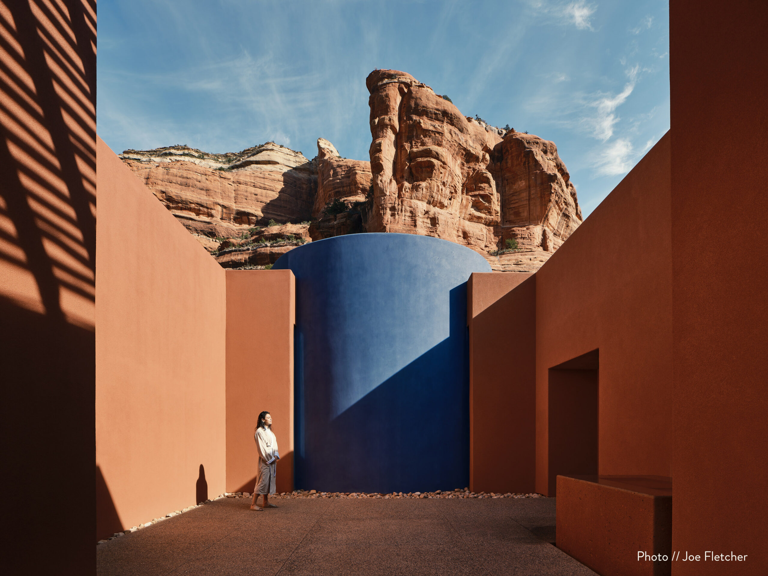 outdoor entrance to mii amo spa with blue wall