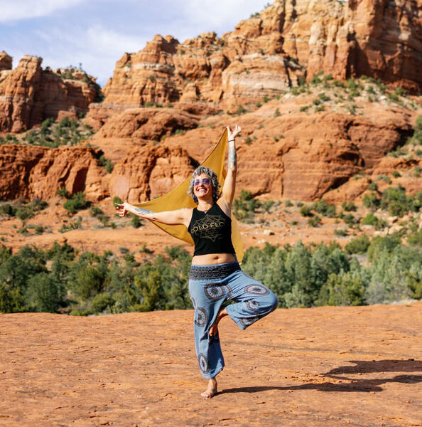 woman doing yoga in the red rocks