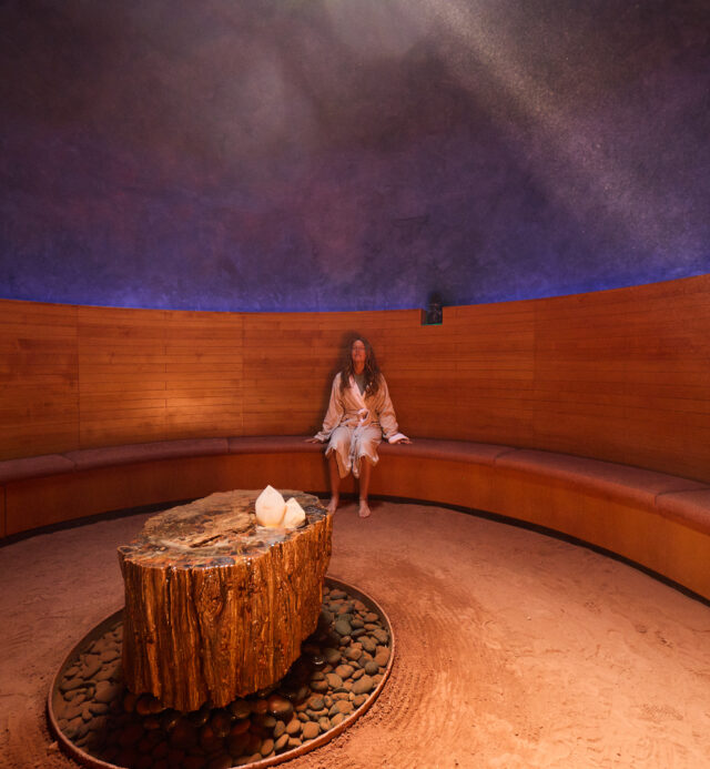 woman in crystal grotto meditating